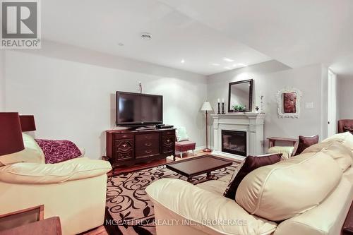 56 Mccabe Street, Greater Napanee, ON - Indoor Photo Showing Living Room With Fireplace