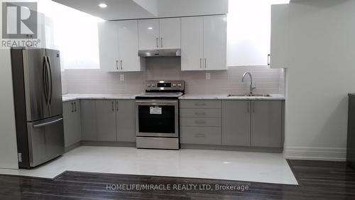 27 Cloverhaven Road, Brampton, ON - Indoor Photo Showing Kitchen With Stainless Steel Kitchen With Double Sink With Upgraded Kitchen