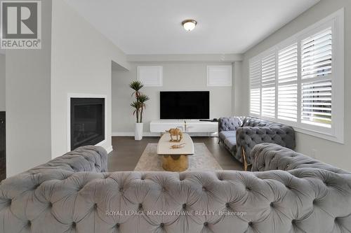 636 Leatherleaf Landing, Milton, ON - Indoor Photo Showing Living Room With Fireplace