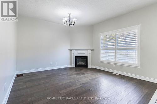 3259 Scotch Pine Gate, Mississauga, ON - Indoor Photo Showing Living Room With Fireplace