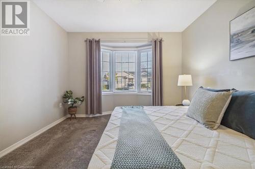 Bedroom featuring carpet - 24 Kenyon Crescent Unit# 45, Grimsby, ON - Indoor Photo Showing Bedroom