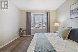 Bedroom featuring carpet - 