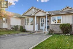 View of front facade with a front yard - 