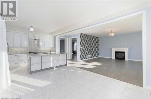 14 Station Drive, Millbrook Village, ON - Indoor Photo Showing Kitchen With Fireplace