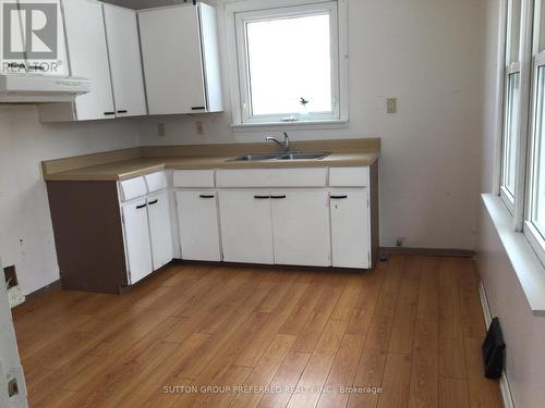 pictures from prior to tenant moving in. - 215 Charles Street W, Ingersoll (Ingersoll - South), ON - Indoor Photo Showing Kitchen With Double Sink