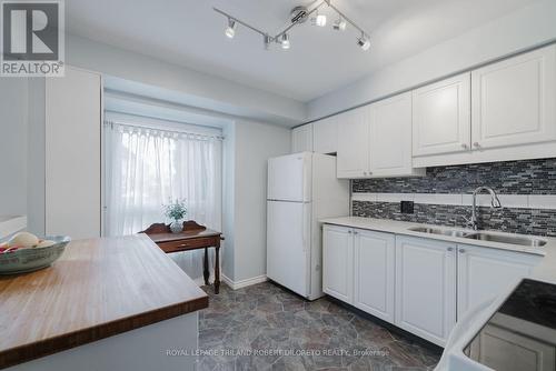 33 - 110 Deveron Crescent, London, ON - Indoor Photo Showing Kitchen With Double Sink