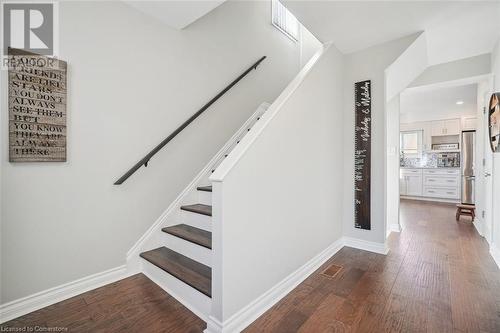 Stairway with hardwood / wood-style floors - 25 Rockwood Avenue, St. Catharines, ON - Indoor Photo Showing Other Room