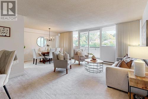 107 - 120 Elgin Street W, Oshawa, ON - Indoor Photo Showing Living Room