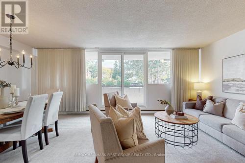 107 - 120 Elgin Street W, Oshawa, ON - Indoor Photo Showing Living Room