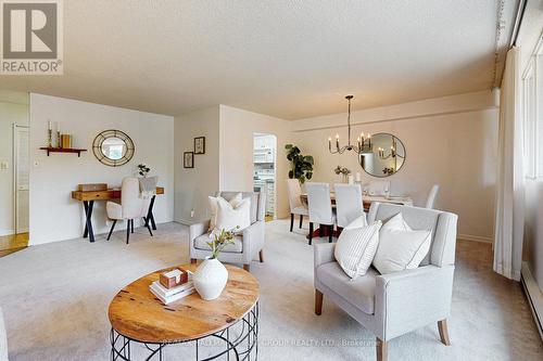 107 - 120 Elgin Street W, Oshawa, ON - Indoor Photo Showing Living Room