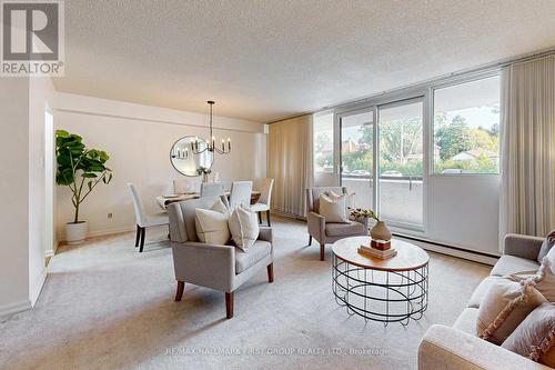 107 - 120 Elgin Street W, Oshawa, ON - Indoor Photo Showing Living Room