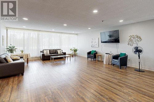 107 - 120 Elgin Street W, Oshawa, ON - Indoor Photo Showing Living Room