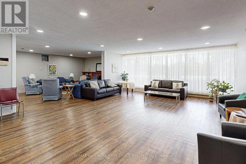 107 - 120 Elgin Street W, Oshawa, ON - Indoor Photo Showing Living Room