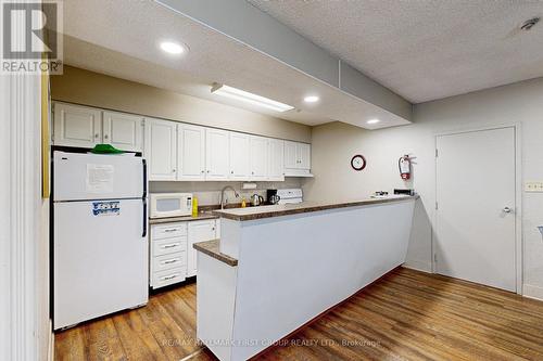 107 - 120 Elgin Street W, Oshawa, ON - Indoor Photo Showing Kitchen