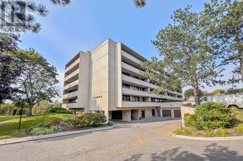 107 - 120 Elgin Street W, Oshawa, ON - Outdoor With Balcony With Facade