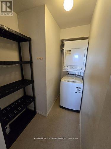 310 - 5235 Finch Avenue E, Toronto, ON - Indoor Photo Showing Laundry Room