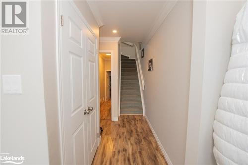 Hallway featuring hardwood / wood-style flooring and ornamental molding - 104 Kellies Way, The Blue Mountains, ON - Indoor Photo Showing Other Room