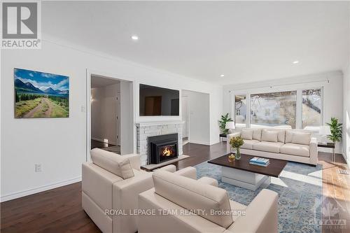 3629 Mcbean Street, Ottawa, ON - Indoor Photo Showing Living Room With Fireplace