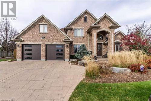 View of front facade featuring a garage - 59 Dominion Drive, Guelph, ON - Outdoor With Facade