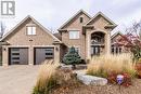 View of front of house with a garage - 59 Dominion Drive, Guelph, ON  - Outdoor With Facade 