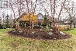 View of front of property featuring a front yard - 