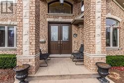 Doorway to property featuring french doors - 