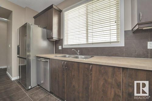 5921 168A Av Nw, Edmonton, AB - Indoor Photo Showing Kitchen With Double Sink