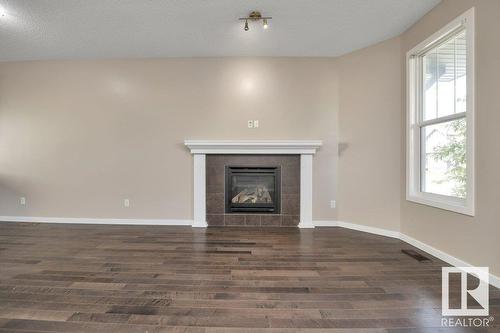 5921 168A Av Nw, Edmonton, AB - Indoor With Fireplace