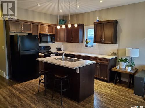 A & B 2735 Mcdonald Street, Regina, SK - Indoor Photo Showing Kitchen With Double Sink