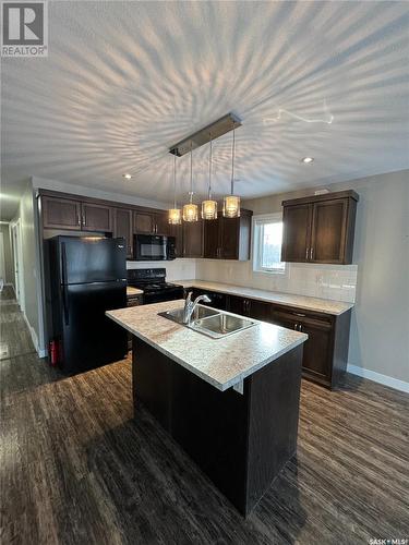 A & B 2735 Mcdonald Street, Regina, SK - Indoor Photo Showing Kitchen With Double Sink