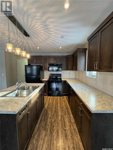 A & B 2735 Mcdonald Street, Regina, SK - Indoor Photo Showing Kitchen With Double Sink