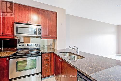 208 - 9235 Jane Street, Vaughan, ON - Indoor Photo Showing Kitchen With Stainless Steel Kitchen With Double Sink