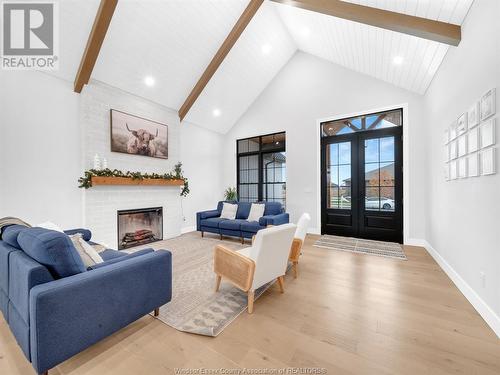 19 Sunningdale, Leamington, ON - Indoor Photo Showing Living Room With Fireplace