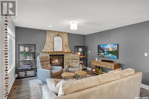 128 Blue Sage Drive, Moose Jaw, SK - Indoor Photo Showing Living Room With Fireplace