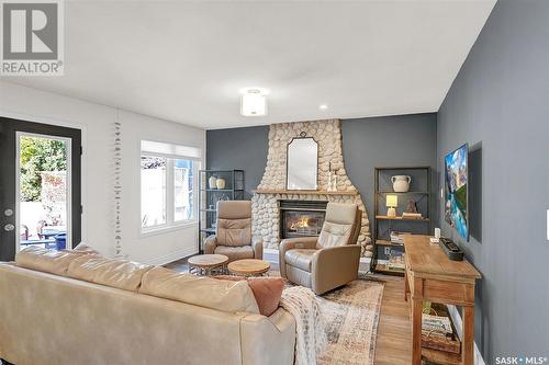 128 Blue Sage Drive, Moose Jaw, SK - Indoor Photo Showing Living Room With Fireplace