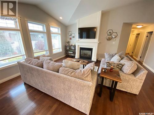 26 Aspen Place, Yorkton, SK - Indoor Photo Showing Living Room With Fireplace