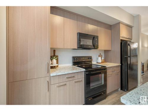 #13 2560 Pegasus Bv Nw, Edmonton, AB - Indoor Photo Showing Kitchen