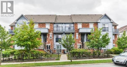 61 - 2275 Bur Oak Avenue, Markham, ON - Outdoor With Facade