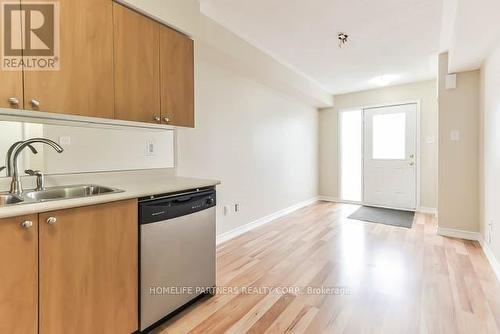 61 - 2275 Bur Oak Avenue, Markham, ON - Indoor Photo Showing Kitchen With Double Sink