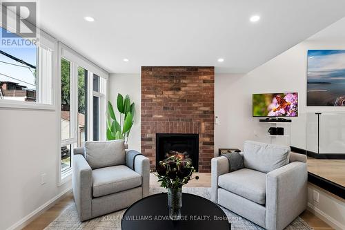 Rear - 386 Concord Avenue, Toronto, ON - Indoor Photo Showing Living Room With Fireplace