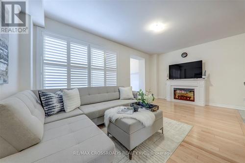 1183 Caliper Lane, Pickering, ON - Indoor Photo Showing Living Room With Fireplace