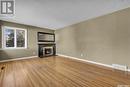 1514 Ewart Avenue S, Saskatoon, SK  - Indoor Photo Showing Living Room With Fireplace 