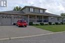 1052 Bay Street, Norfolk (Port Rowan), ON  - Outdoor With Deck Patio Veranda With Facade 