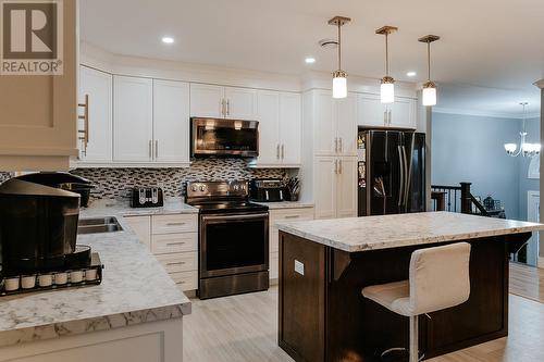 265 Main Street, Wing'S Point, NL - Indoor Photo Showing Kitchen With Double Sink With Upgraded Kitchen