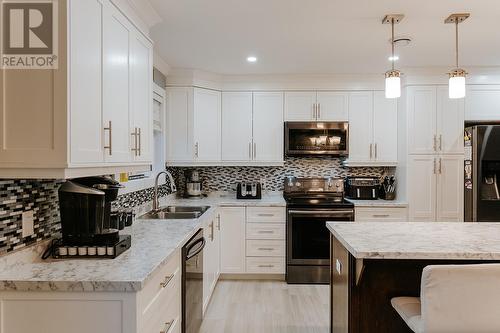 265 Main Street, Wing'S Point, NL - Indoor Photo Showing Kitchen With Double Sink With Upgraded Kitchen