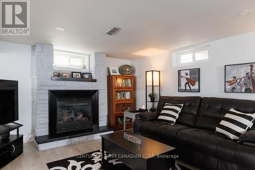 82 Queenston Crescent, London, ON - Indoor Photo Showing Living Room With Fireplace