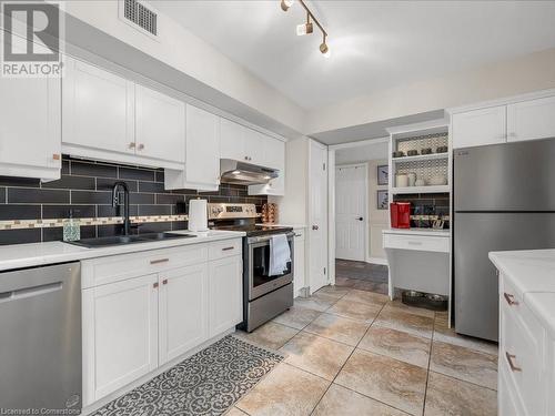 49 Robinson Street Unit# 300, Hamilton, ON - Indoor Photo Showing Kitchen With Double Sink