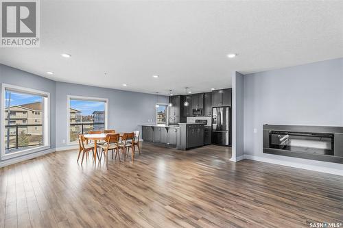 202 2800 Lakeview Drive, Prince Albert, SK - Indoor Photo Showing Living Room With Fireplace