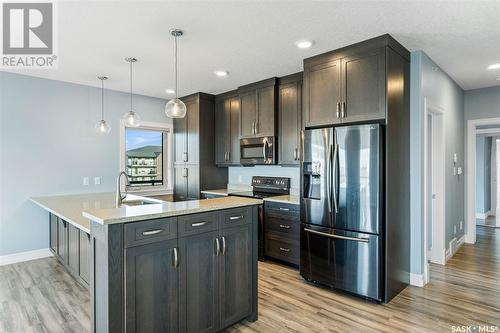 202 2800 Lakeview Drive, Prince Albert, SK - Indoor Photo Showing Kitchen With Upgraded Kitchen