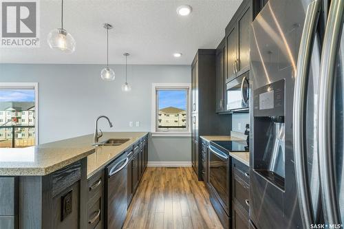 202 2800 Lakeview Drive, Prince Albert, SK - Indoor Photo Showing Kitchen With Double Sink With Upgraded Kitchen